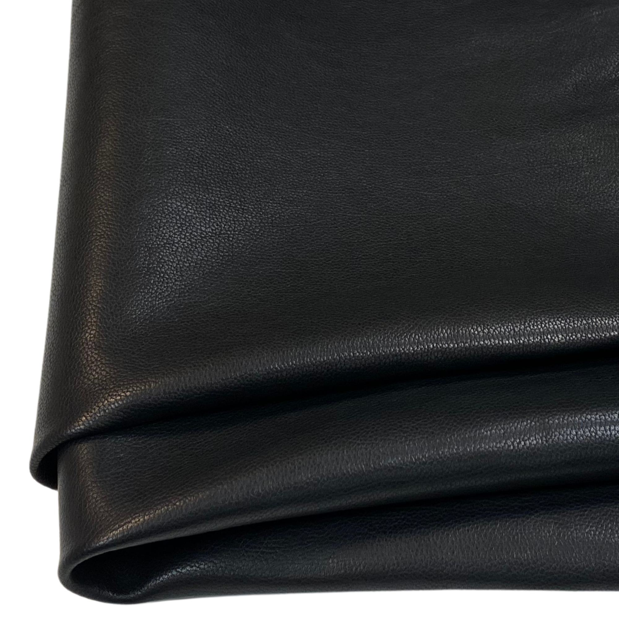 Gefaltetes schwarzes Kunstleder, ideal für Polster- und Handwerksarbeiten